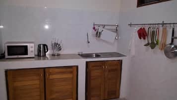 Apartemen, 4 kamar tidur | Dapur kecil pribadi | Lemari es, microwave, oven, dan kompor
