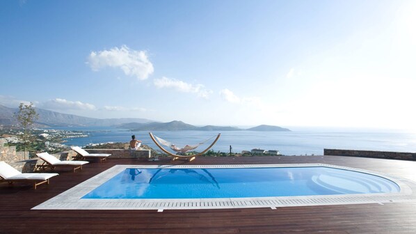 Outdoor pool, pool umbrellas, pool loungers