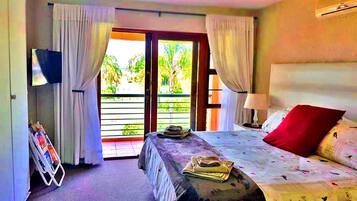 Apartemen Deluks, 2 kamar tidur | 2 kamar tidur, seprai premium, brankas, dan Wi-Fi gratis