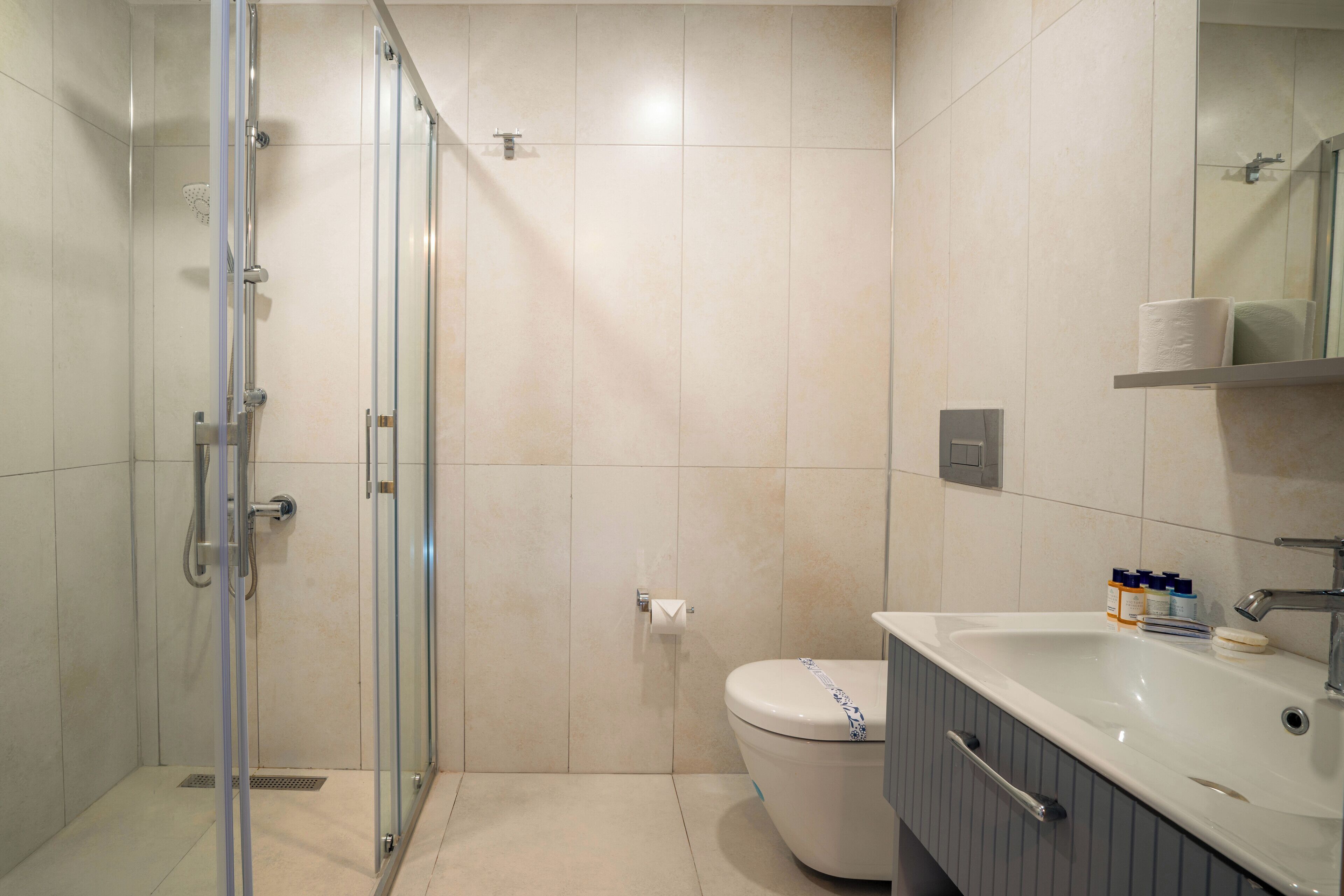 shower, hair dryer, bathrobes, towels