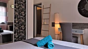 4 slaapkamers, een bureau, een strijkplank/strijkijzer, reisbedje