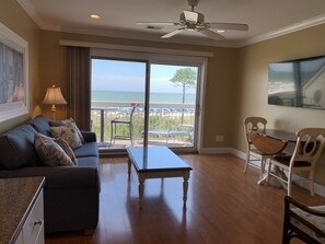 View from kitchen into the Living Room and direct oceanfront