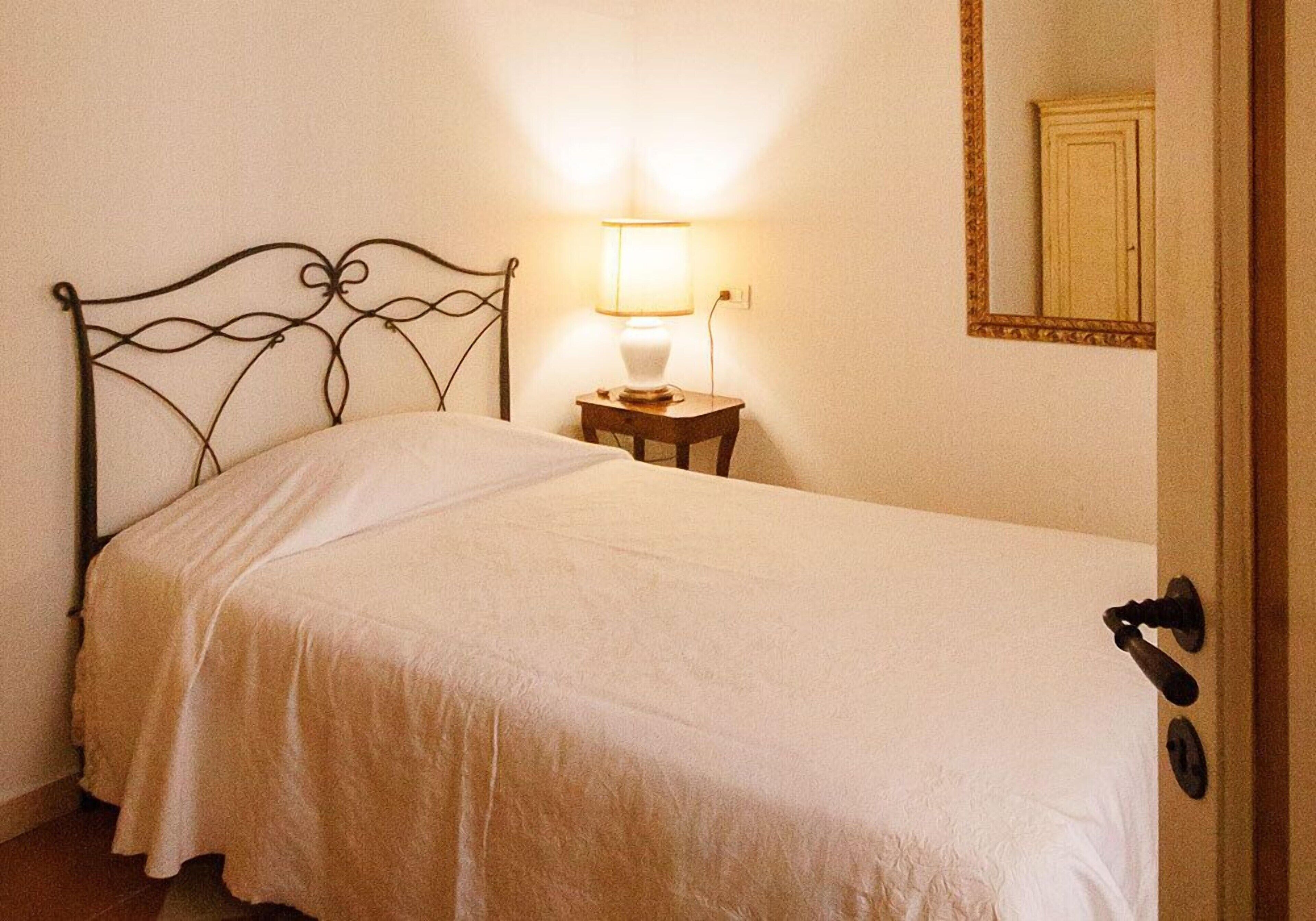Desk, laptop workspace, free WiFi, bed sheets