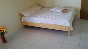 Economy Single Room | 1 bedroom, iron/ironing board, free cribs/infant beds, WiFi