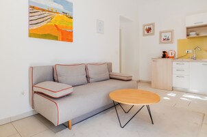 Klassiek appartement | Woonruimte | Een lcd-televisie