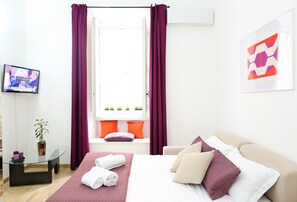 Apartment | Living area | Flat-screen TV - Home2Rome - Trastevere Natale (Rome)