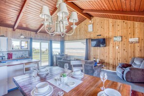 Standard Suite, 2 Bedrooms, Kitchen, Partial Ocean View | Living area | Flat-screen TV