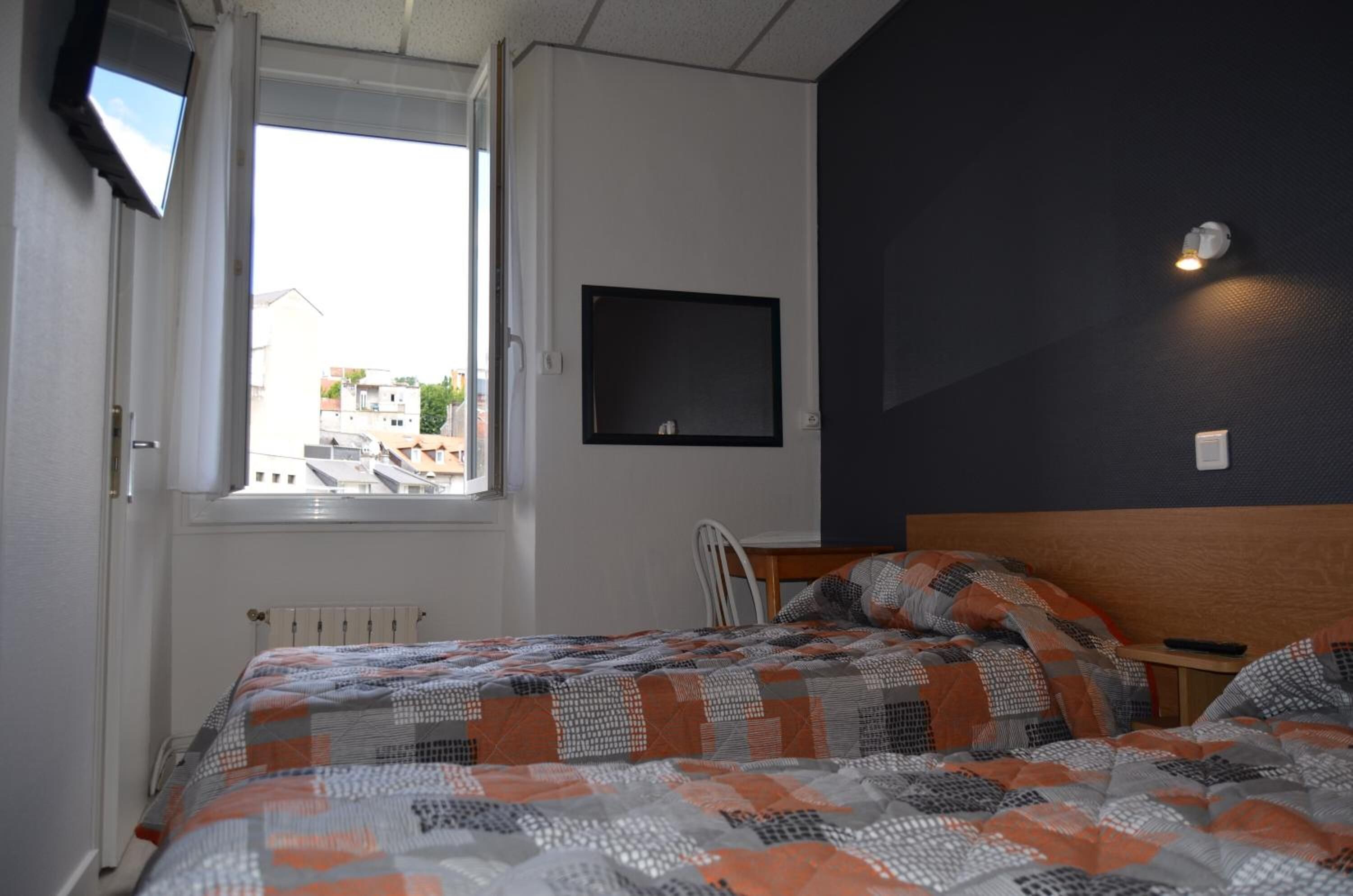 individually decorated, individually furnished, desk, blackout curtains