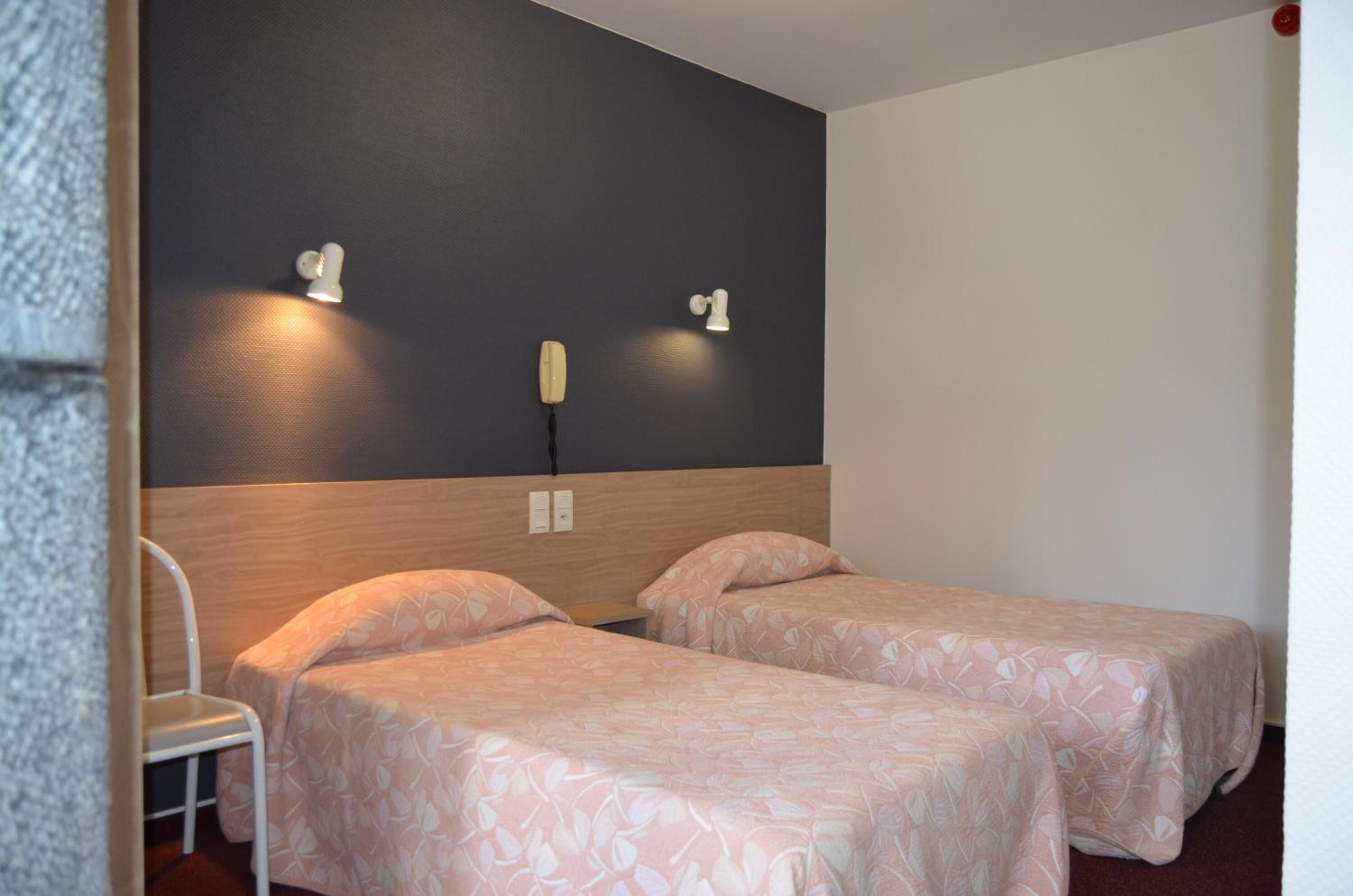 individually decorated, individually furnished, desk, blackout curtains