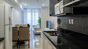 Standard Apartment, 2 Double Beds | Private kitchen | Full-size fridge, microwave, stovetop, coffee/tea maker