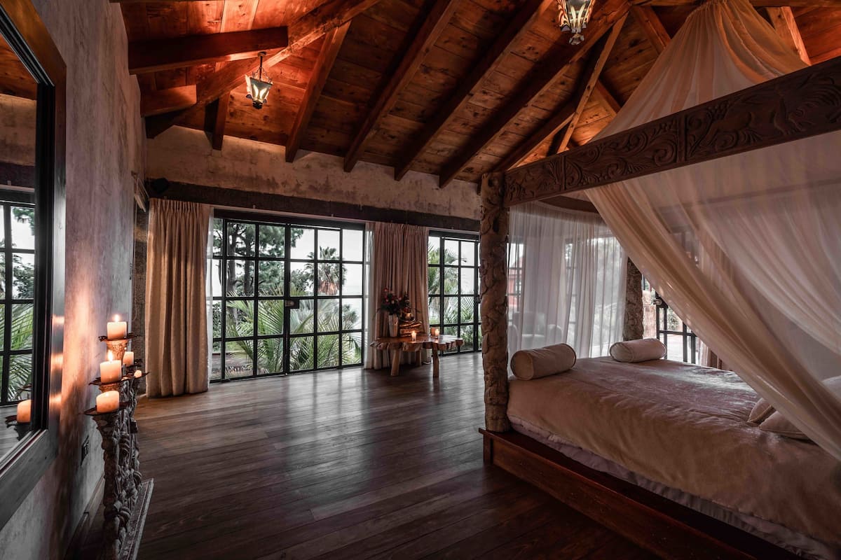 luxury suite, 1 king bed, lake view, lakeside | 1 bedroom, down duvets, pillow-top beds, minibar
