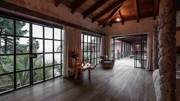 Luxury Suite, 1 King Bed, Lake View, Lakeside | Living area | Tablet, MP3 dock