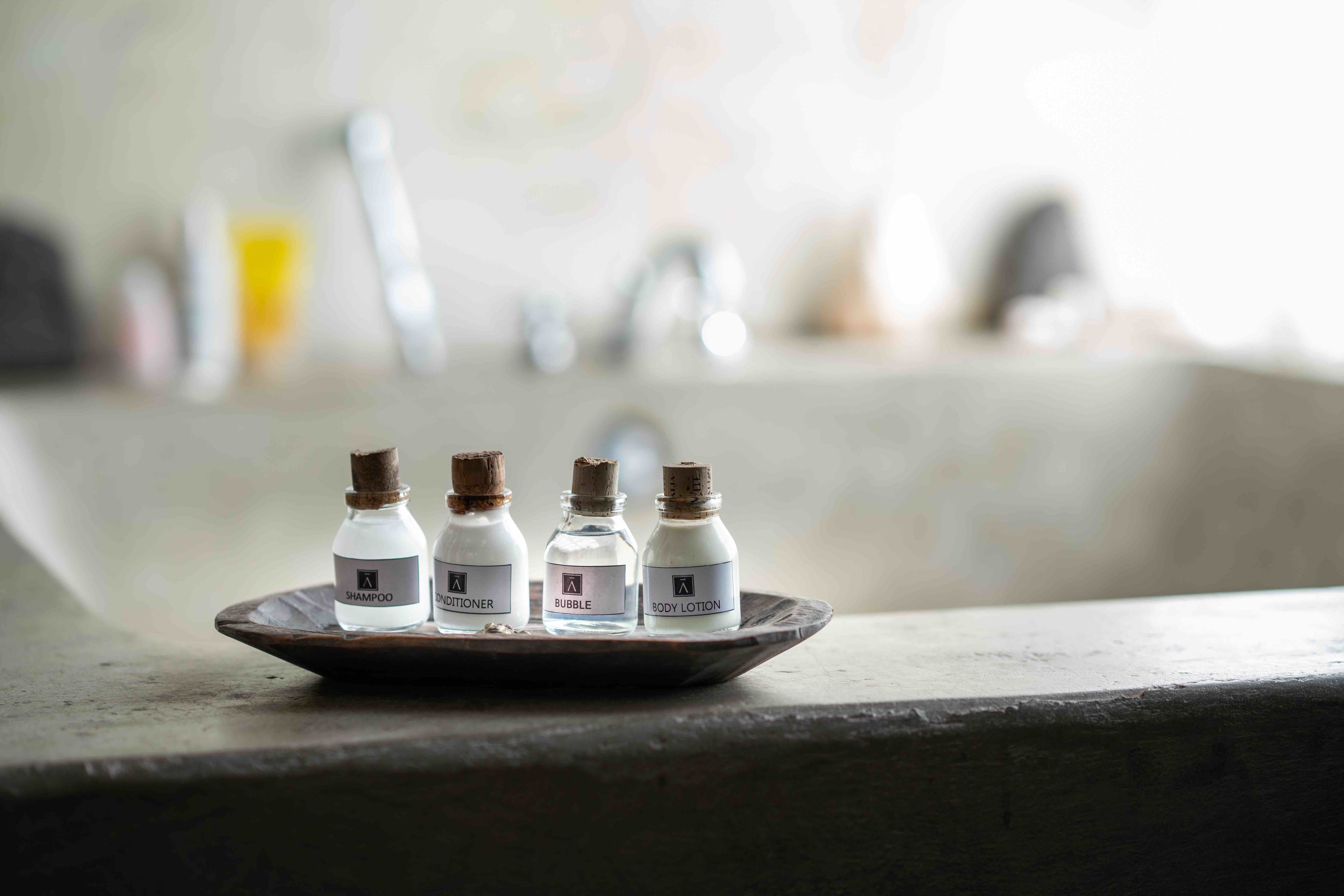 junior suite, 1 king bed, lake view, lakeside | bathroom amenities | free toiletries, hair dryer, bathrobes, towels