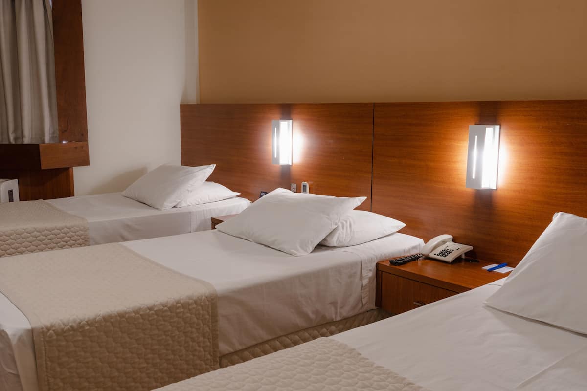 deluxe triple room | 1 bedroom, minibar, desk, blackout curtains