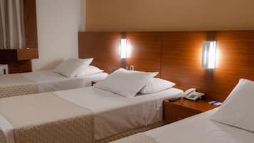 Deluxe Triple Room | Minibar, desk, blackout drapes, iron/ironing board