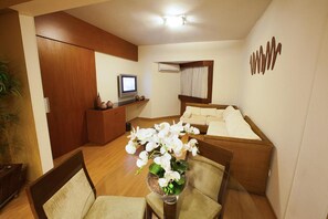 Minibar, desk, blackout curtains, iron/ironing board