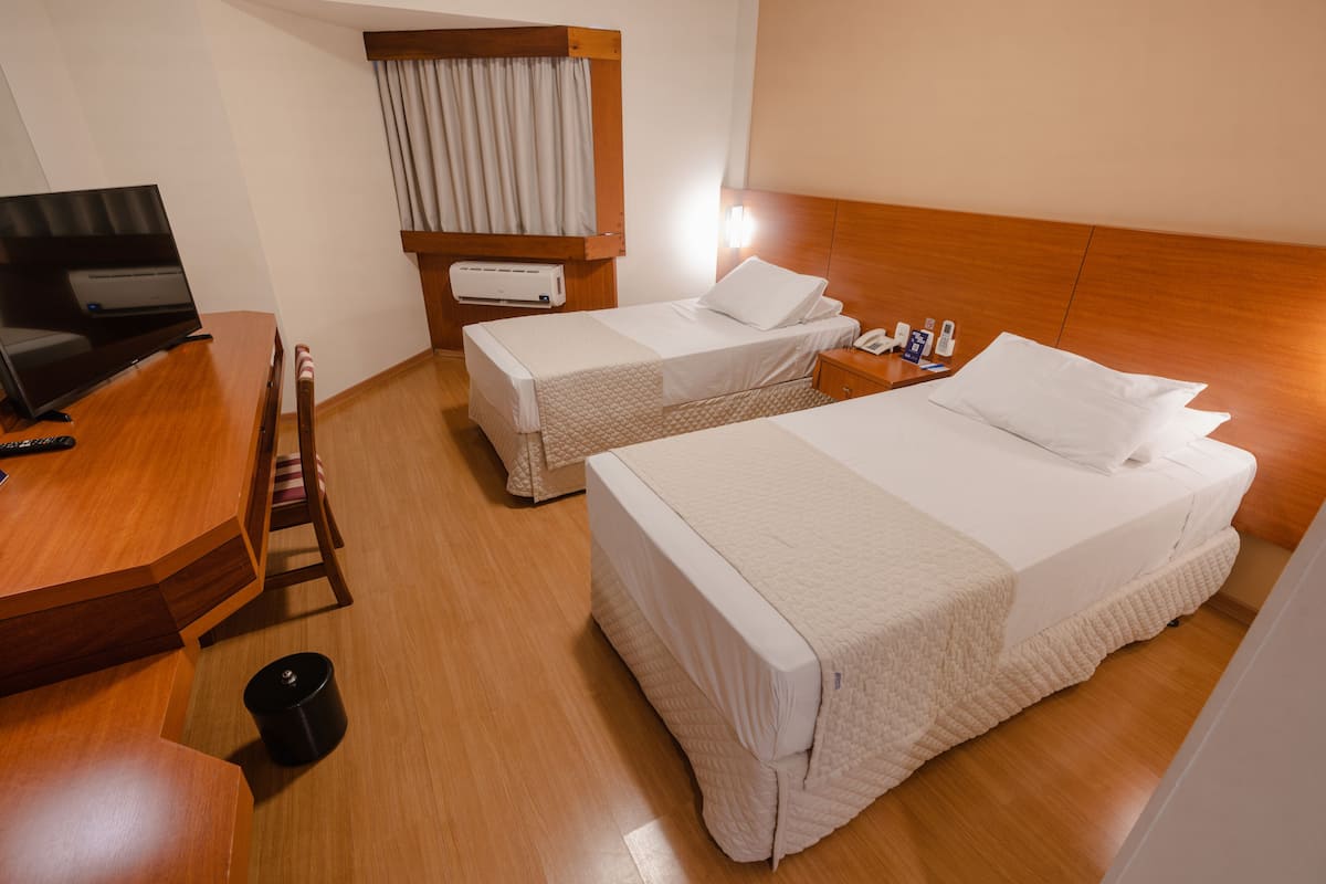 Minibar, desk, blackout curtains, iron/ironing board