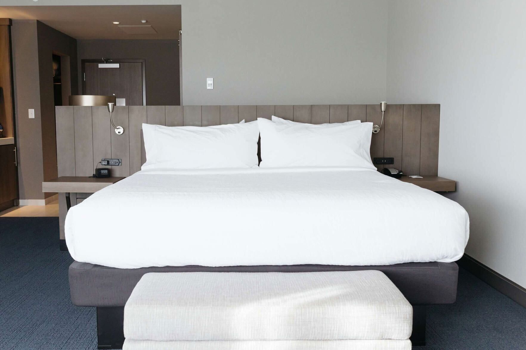 Hypo-allergenic bedding, iron/ironing board, cots/infant beds