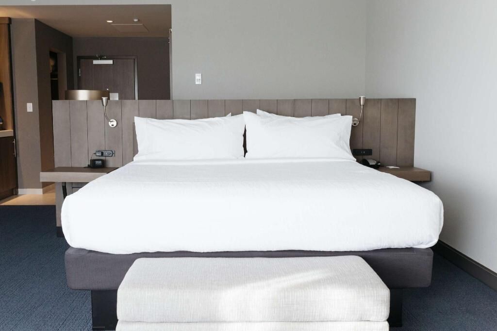Hypo-allergenic bedding, iron/ironing board, cots/infant beds