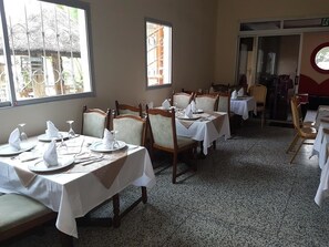 Breakfast, lunch, dinner served; local and international cuisine