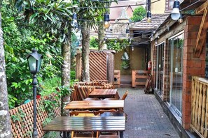 Outdoor dining - Locar-in Gramado Loft a 50 metros da Rua Coberta (Gramado)