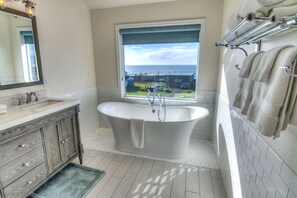 Bathtub, hair dryer, towels