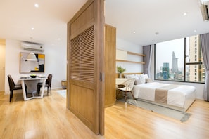 Deluxe Apartment, 2 Bedrooms, Pool Access, City View | Living area | Flat-screen TV, pay films - Blue Fingers Rivergate (Ho Chi Minh City)