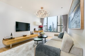 Deluxe Apartment, 2 Bedrooms, Pool Access, City View | Living room