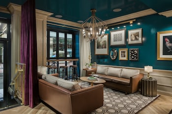 Sitting area in hotel lobby at Merrion Row Hotel and Public House