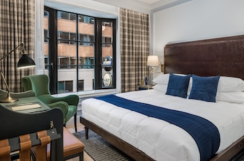 Premium Room, 1 King Bed | In-room safe, blackout drapes, iron/ironing board, bed sheets at Merrion Row Hotel and Public House