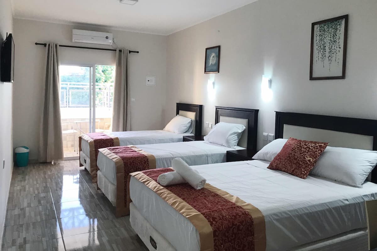 Superior Quadruple Room, Balcony | Premium bedding, Select Comfort beds, in-room safe