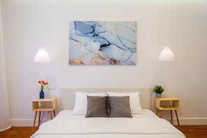 Chambre Deluxe, salle de bain privée | Décor unique, ameublement unique, rideaux d’obscurcissement