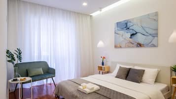 Habitació Deluxe, bany privat | Decoració individual, mobiliari individual i cortines opaques