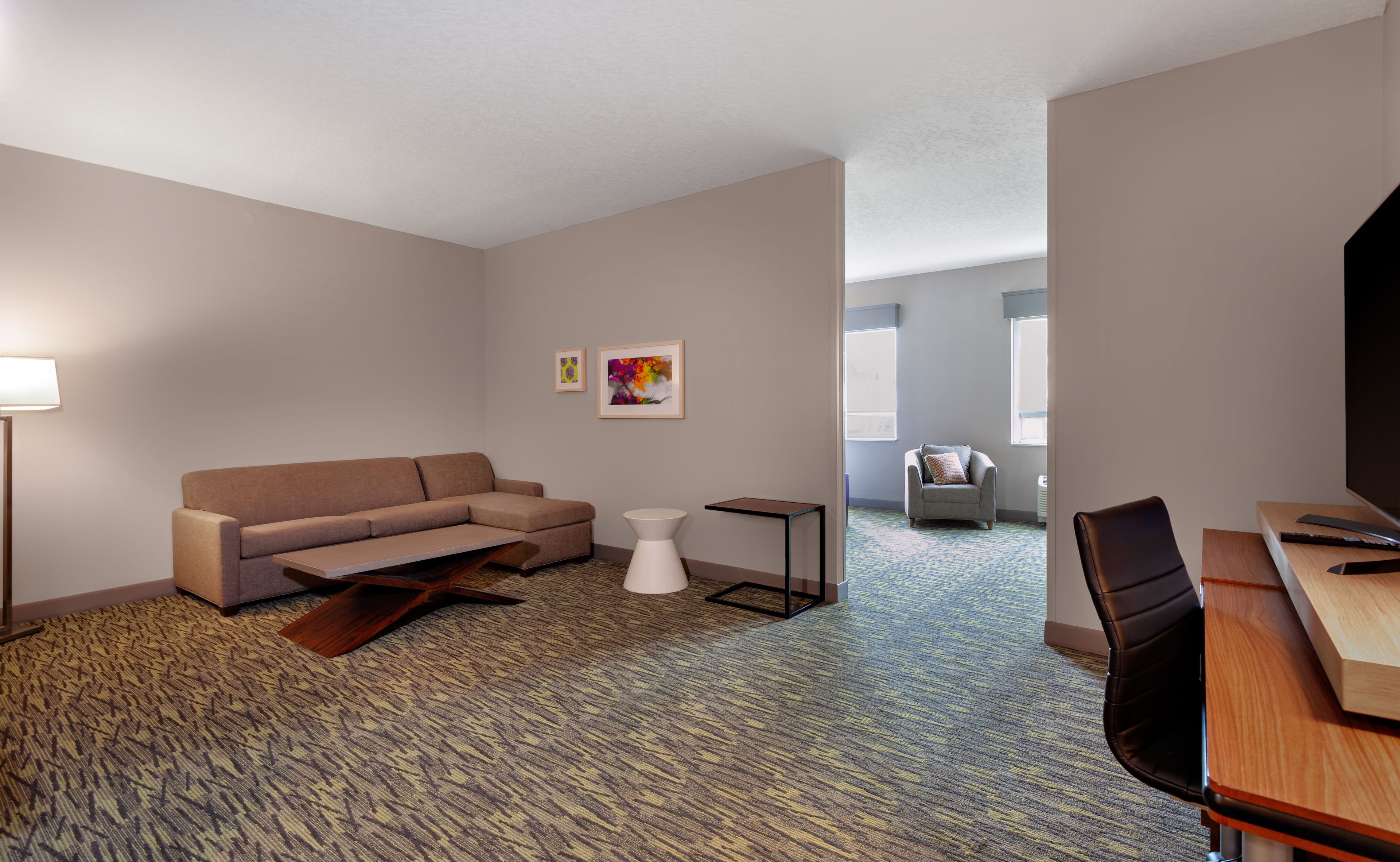 hypo-allergenic bedding, desk, laptop workspace, blackout curtains