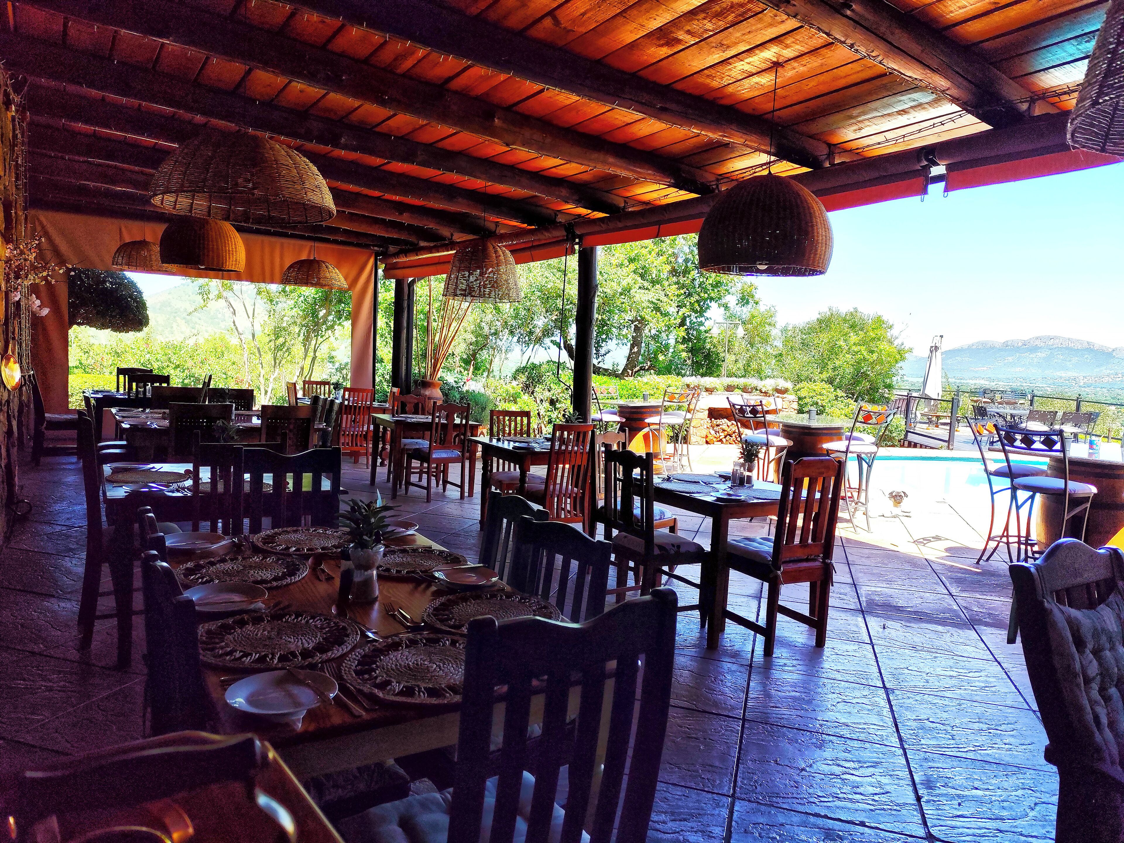 Breakfast, lunch served; local and international cuisine, garden views 