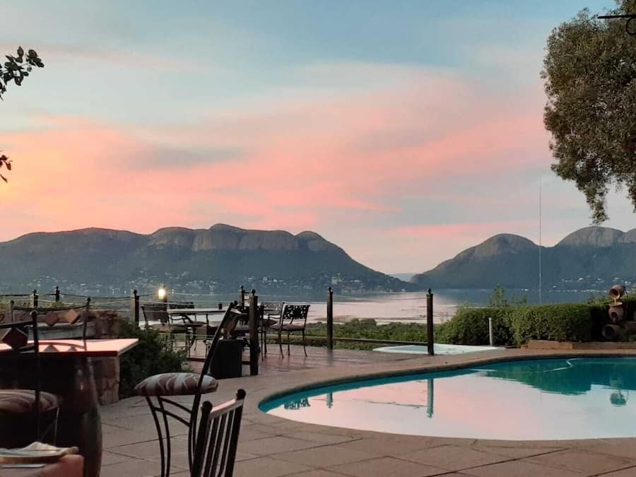 2 outdoor pools, pool umbrellas, pool loungers