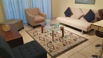 APARTAMENTO 1 | Phòng khách | TV màn hình phẳng