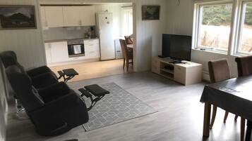 Family Apartment, 3 Bedrooms | Living room | Flat-screen TV