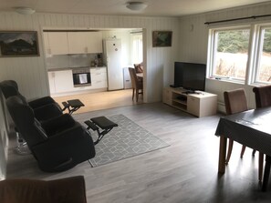 Family Apartment, 3 Bedrooms | Living room | Flat-screen TV