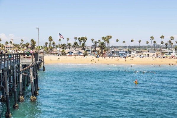 On the beach, beach towels, surfing, motor boating
