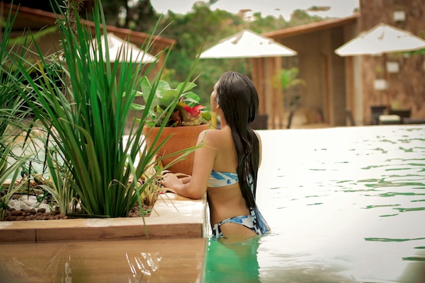 Outdoor pool, open 9:30 AM to 6:00 PM, pool loungers