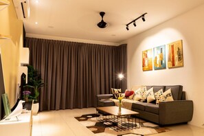 Southwest Suite Reimagined | Living room | Flat-screen TV - Southwest Designer's Suite by D Imperio Homestay (George Town)