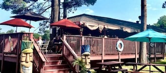 Gorgeous lakefront cabin, wrap-around enclosed porch, dock!
