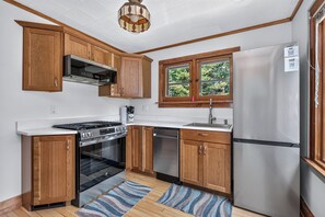 Coffee/tea maker, fridge, oven, stovetop - Gorgeous lakefront cabin, wrap-around enclosed porch, dock! (St Germain)