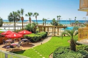 Outdoor dining - Direct Beachfront-Ocean Views~Pelican Beach Resort unit 816-Updated throughout🏖️  (Destin)
