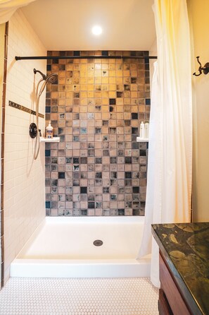 Combined shower/tub, hair dryer, towels, soap