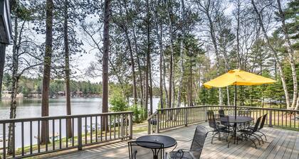 Spacious executive lakefront home on Little Saint with dock, firepit, seating!