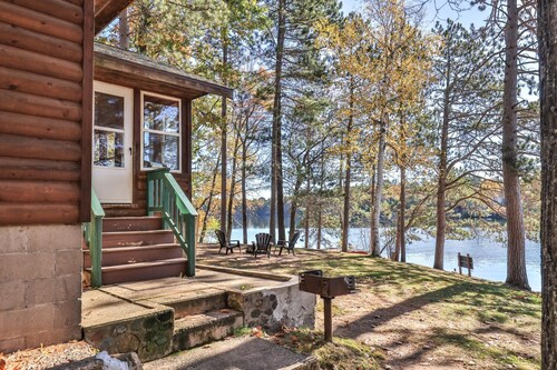 Lakeside resort cabin right on Little Saint with dock, sandy beach, firepit!