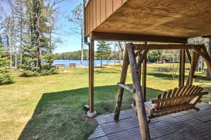 Property grounds - Level lakefront property with spacious cabin, private dock, and fire pit! (St. Germain)