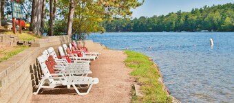 Lakeside resort cabin right on Little Saint with dock, sandy beach, firepit!